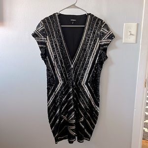 Express black sequins dressed XL . Worn for photoshoot . No tag.